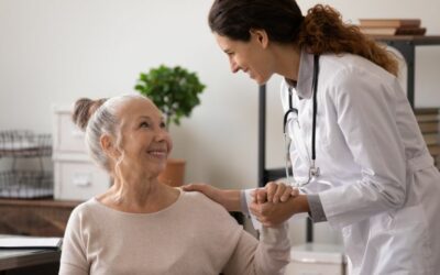 Patient and doctor smiling